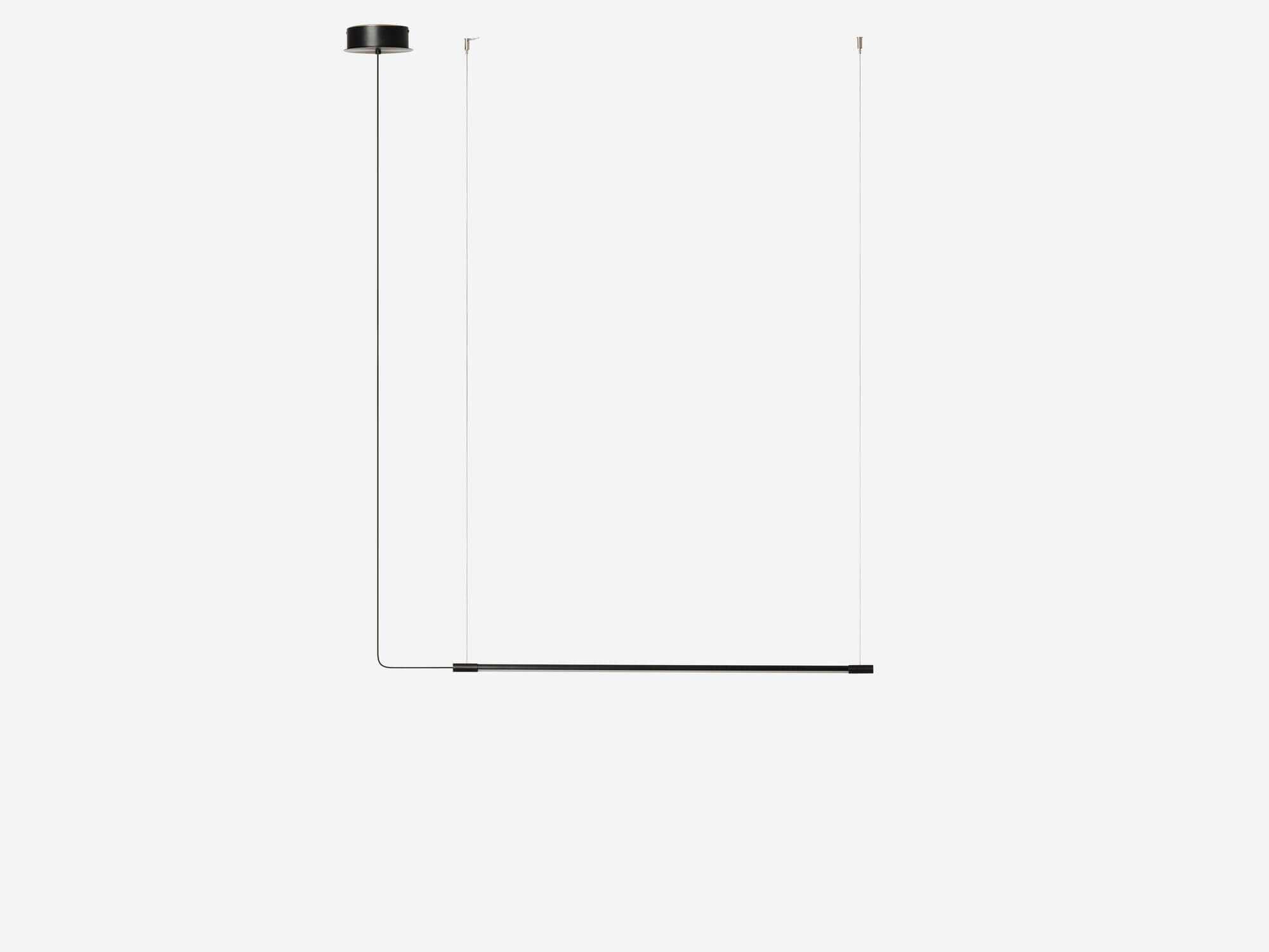Side view of small slim black pendant lamp